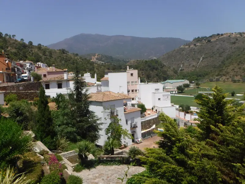Benahavís village among green mountains